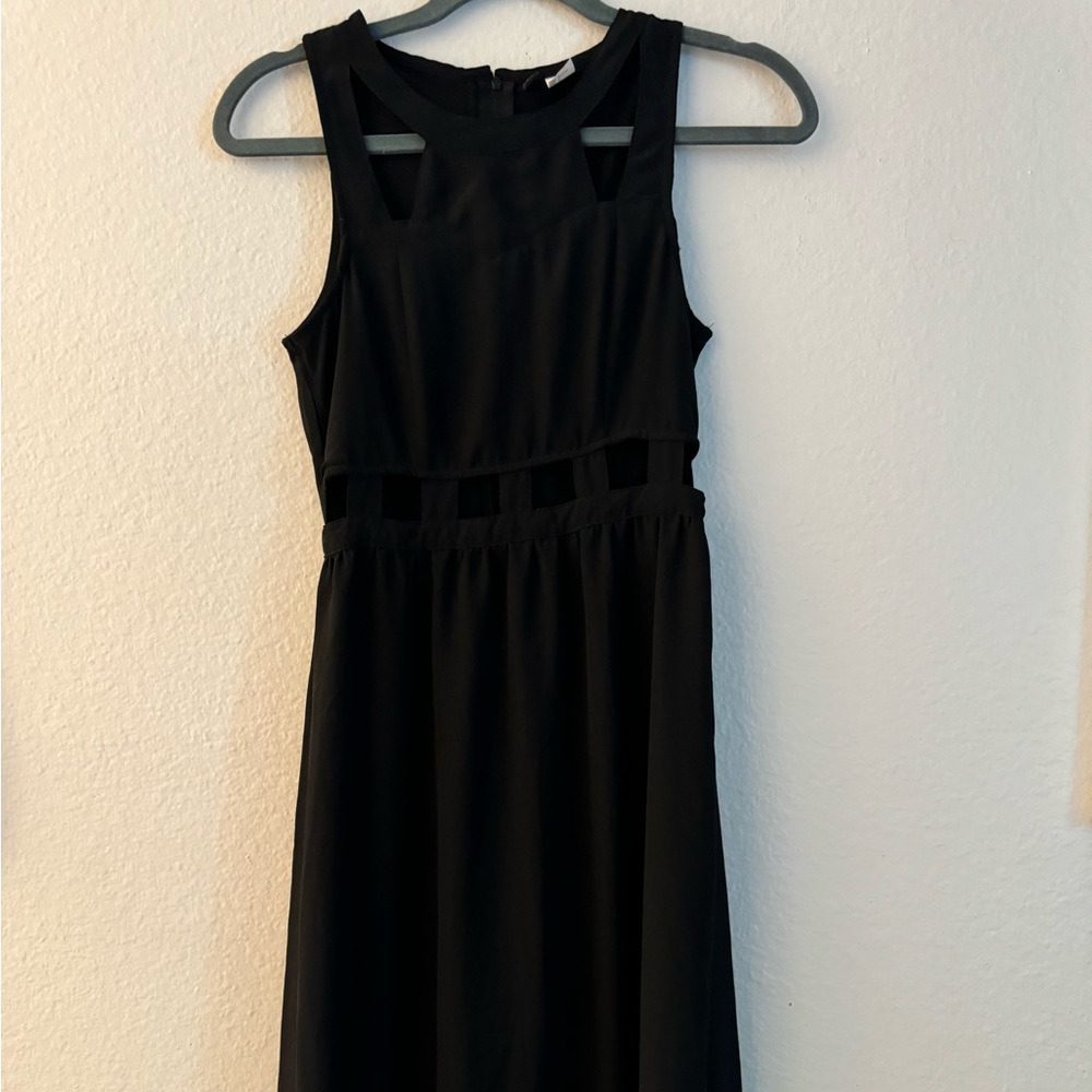 Maxi black dress with cut out parts and see thru top layer